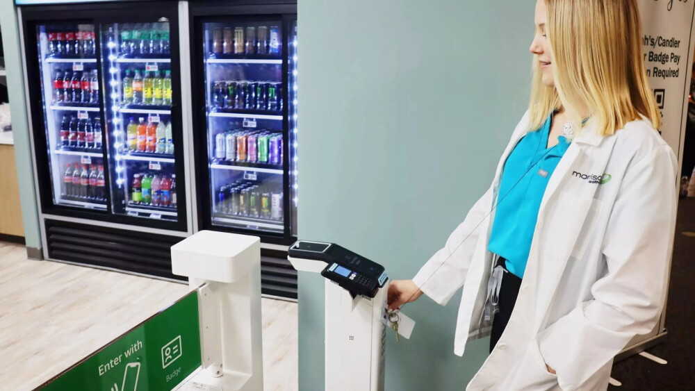 image of healthcare employee swiping in to Just Walk Out technology-enabled store