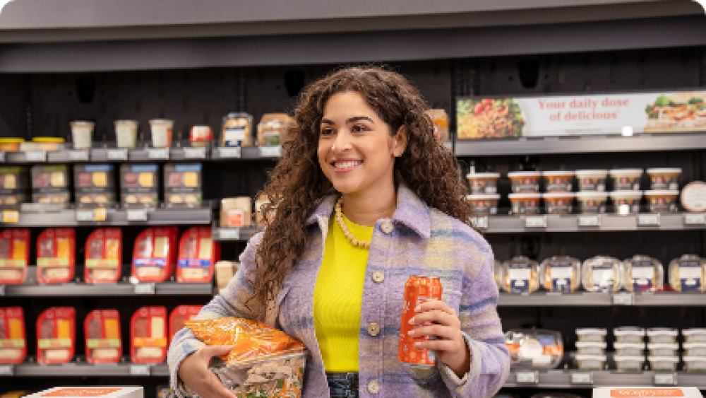 woman walking out with food