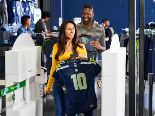 A couple exiting after paying at the gate