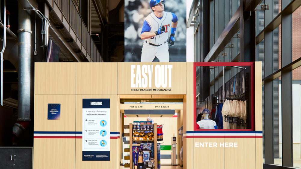 Custom storefront with an image of a baseball player above the door. The door is open showing products for purchase inside.