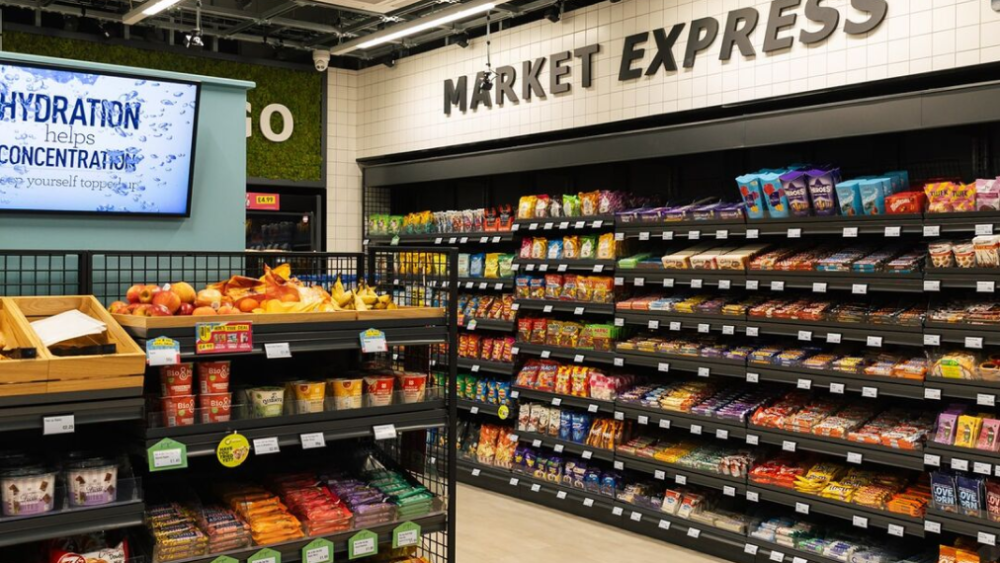 Store with shelves of snacks, candy, and fruit
