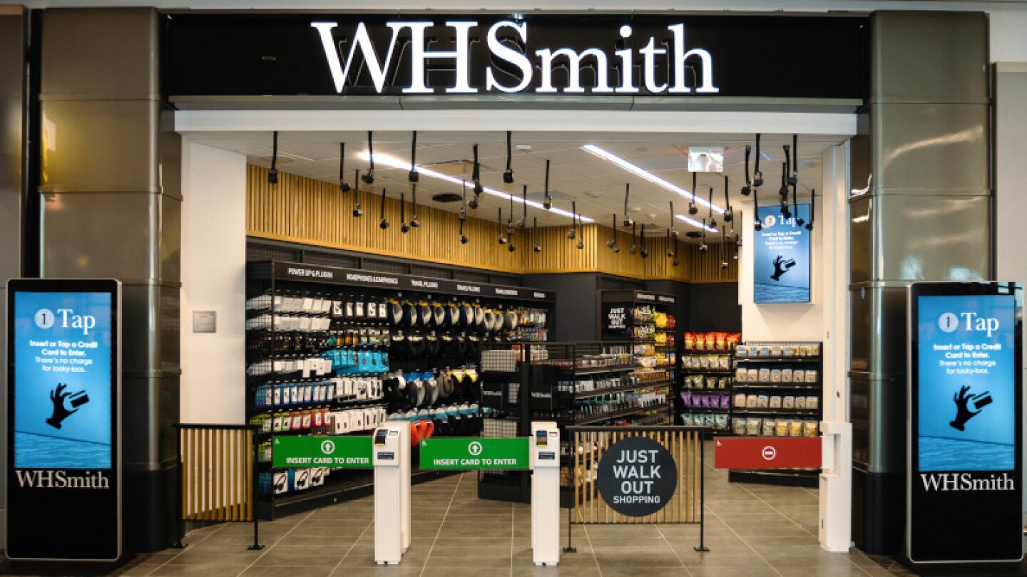 WHSmith storefront in an airport with Just Walk Out technology at the entrance to the store