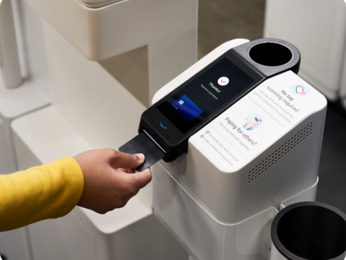 A credit card being used at an exit gate